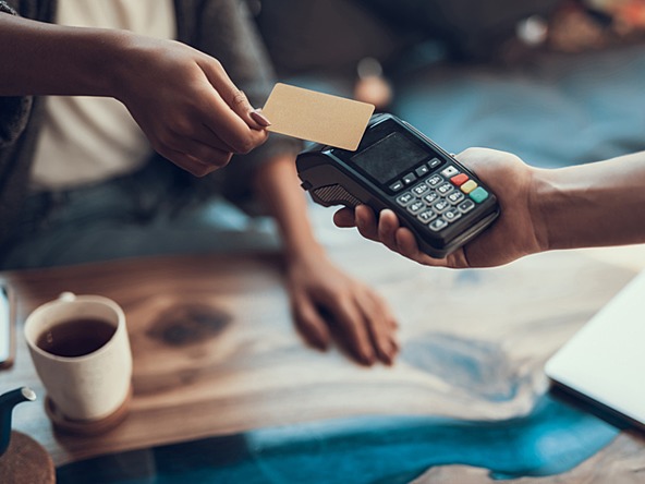 Person paying for coffee